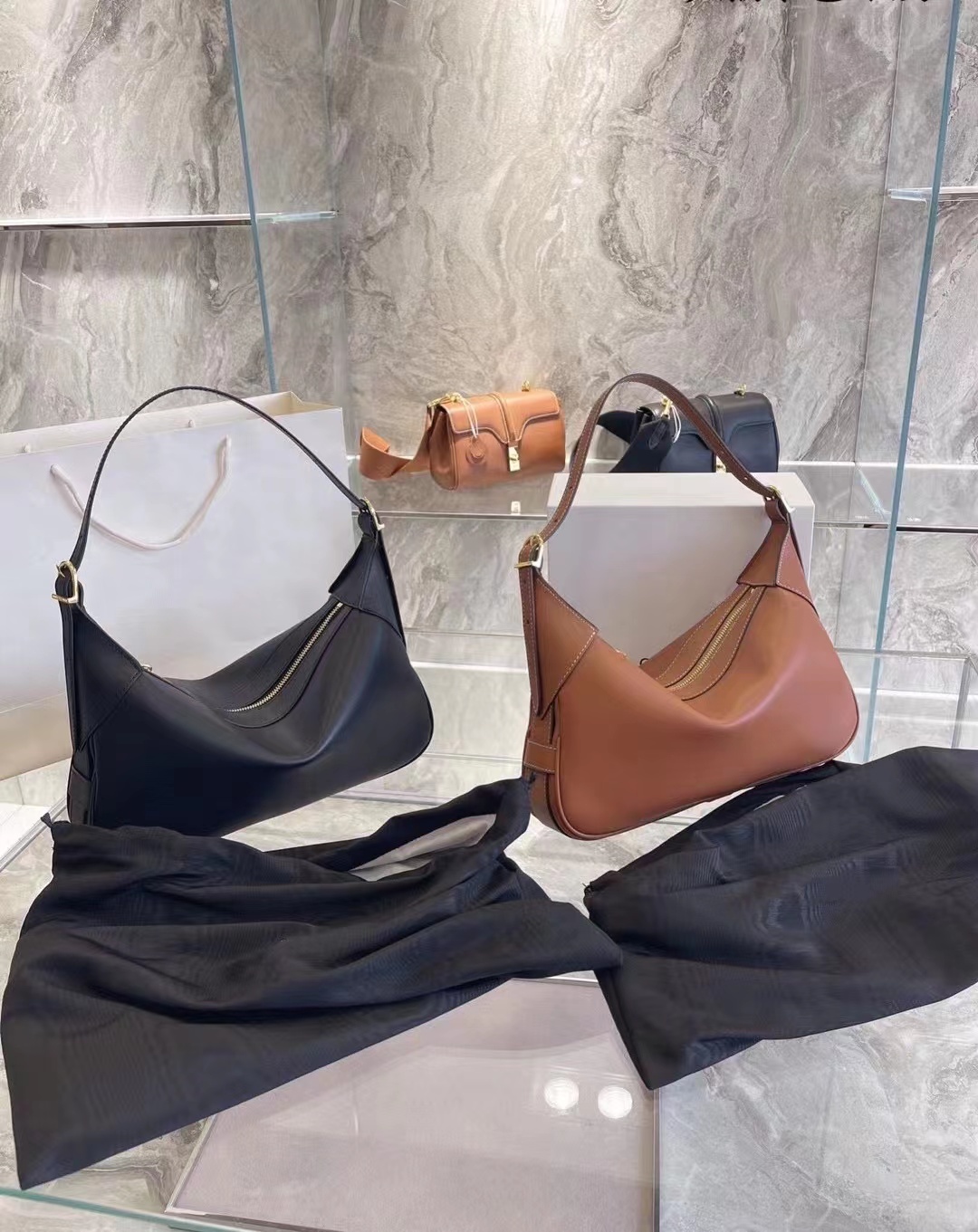 

Classic Romy Armpit Bag , Good Quality Cowhide Leather Shoulder-bag . Soft leather material 16 Handbag Small Tabou Cross-body mini Bags with lock 3 different designs.