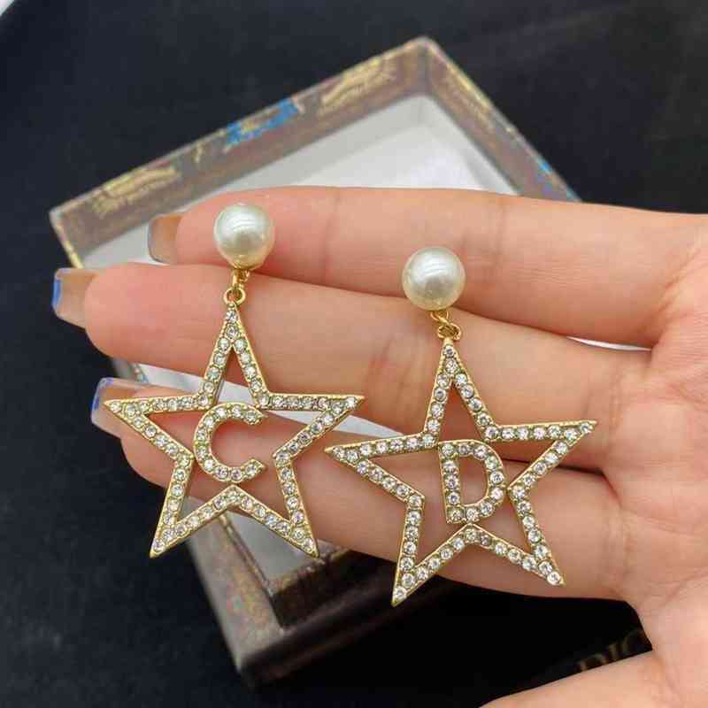 Boutique d'usine en ligne 60% de réduction sur la nouvelle lettre étoile des boucles d'oreilles de luxe féminines cloutées