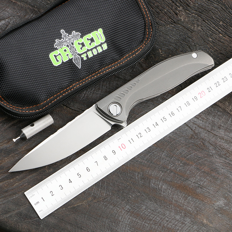 

Green thorn CD f3ns folding knife D2 / K110 blade material TC4 titanium handle is suitable for outdoor camping hunting or household fruit EDC tools.