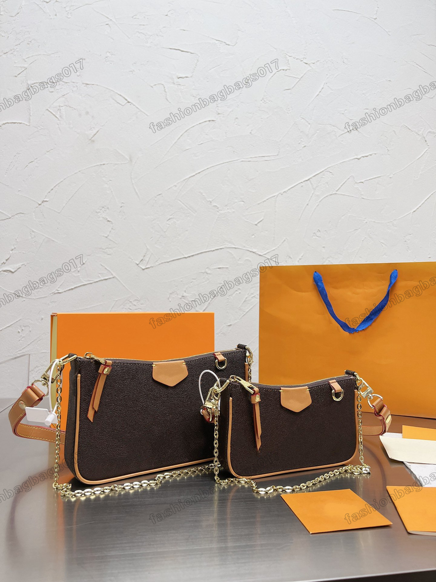 

Easy Pouch On Strap Designer Shoulder Bag Classic Brown Monograms Pattern Empreinte Leather with Golden Chain Luxurys Womens Underarm Bags