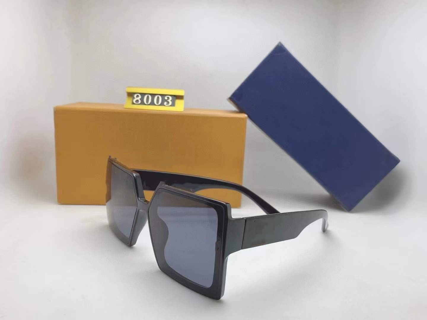 

Luxury Designer Brand rivets Sunglasses 8003 Rimless Womens Fashion Glasses anti-UV400 Simple atmosphere Style Eyewear With Case