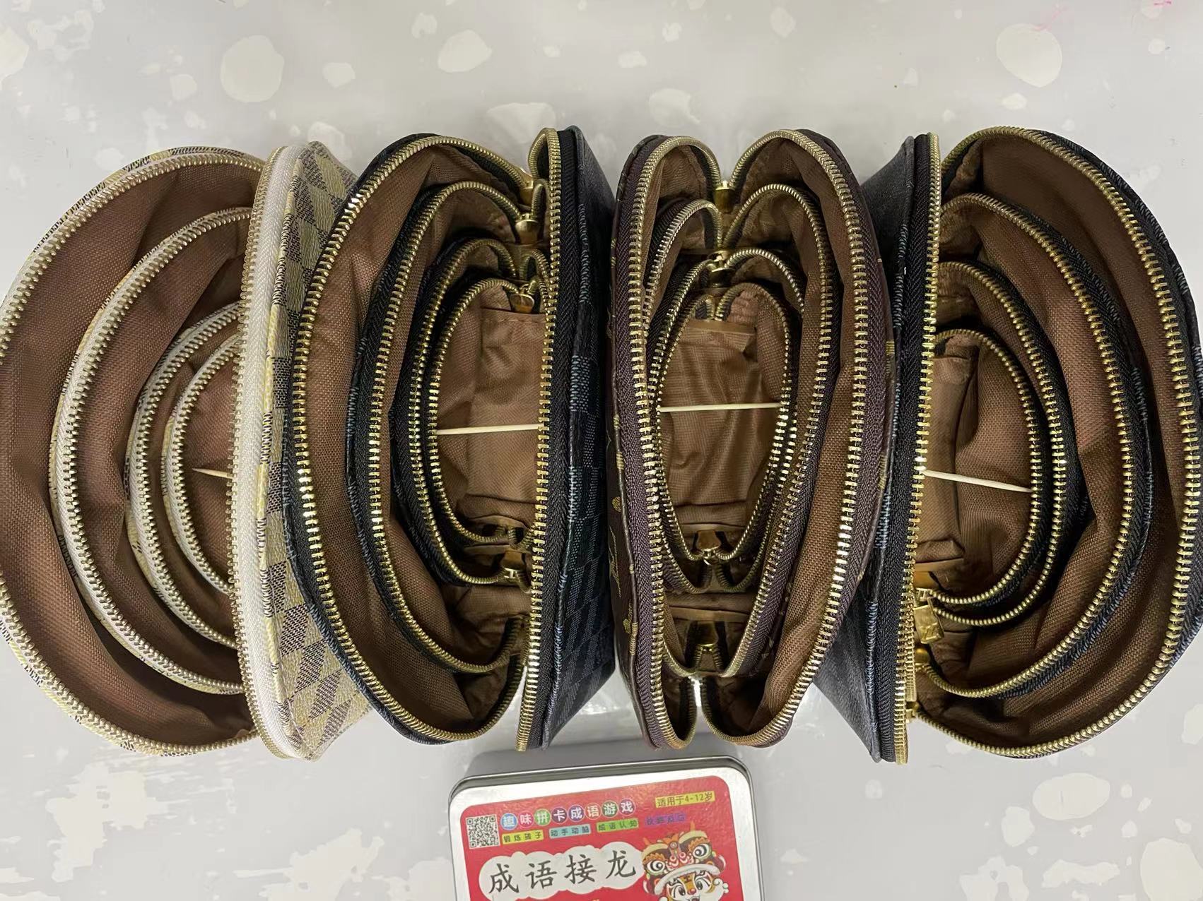 

free shippings 4pcs/set Women cosmetic bags famous makeup bag travel pouch make up handbag ladies Clutch Bagss purses toiletry bao #61588, Customize