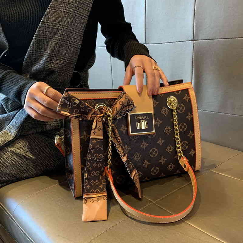 

60% Off Wholesale Women's Bag 2022 Spring New Fashion Printing Chain Single Shoulder Versatile High-capacity Portable Msenger Trend Letter Printed Shoulder Handbags, Classic old flower