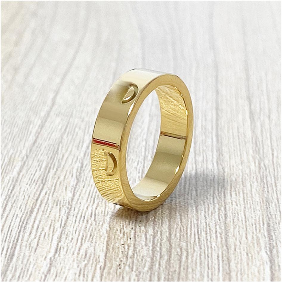 

TITANIUM STEEL LOVE RING GOLD SILVER ROSE GOLD WEDDING BAND RINGS FOR WOMEN ENGAGEMENT RINGS MEN WHOLES JEWELRY BOXES247p