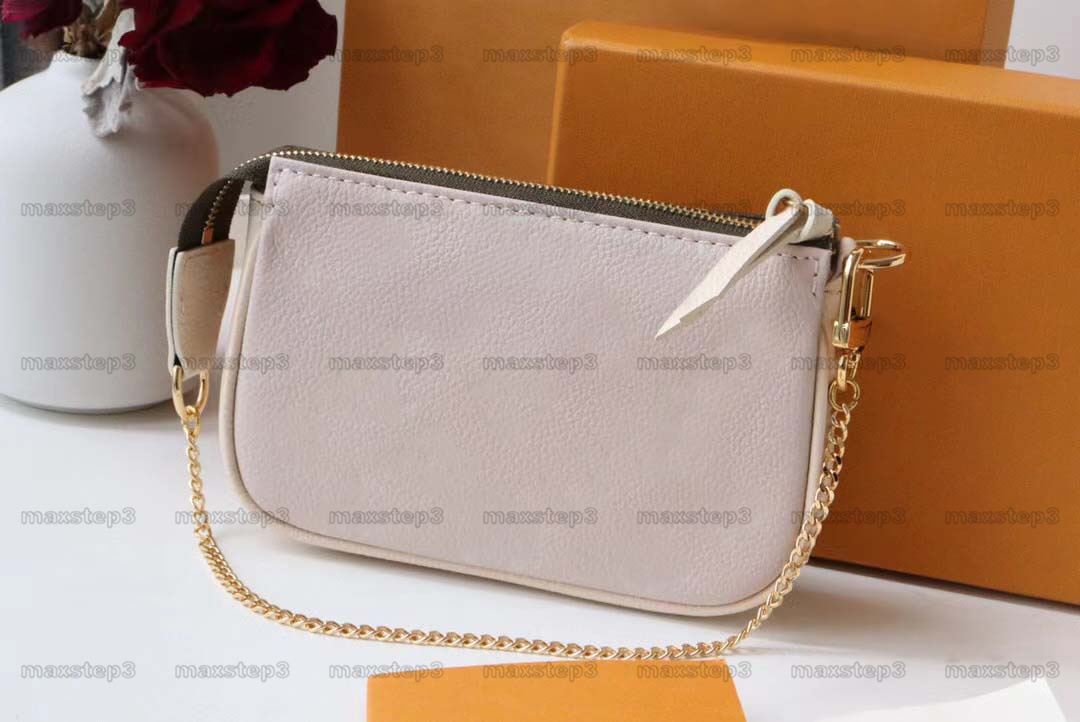 

Mini Pochette bag Spring Escape embossed Monograms Empreinte leather two-in-one Multi-function Bags Zipped Pockets Shoulder Bags designers M81284