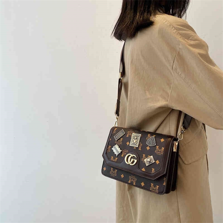 

62% OFF trendy bags 2022 New Designer Handbags trend small square cartoon single shoulder diagonal cross, Brown stripe