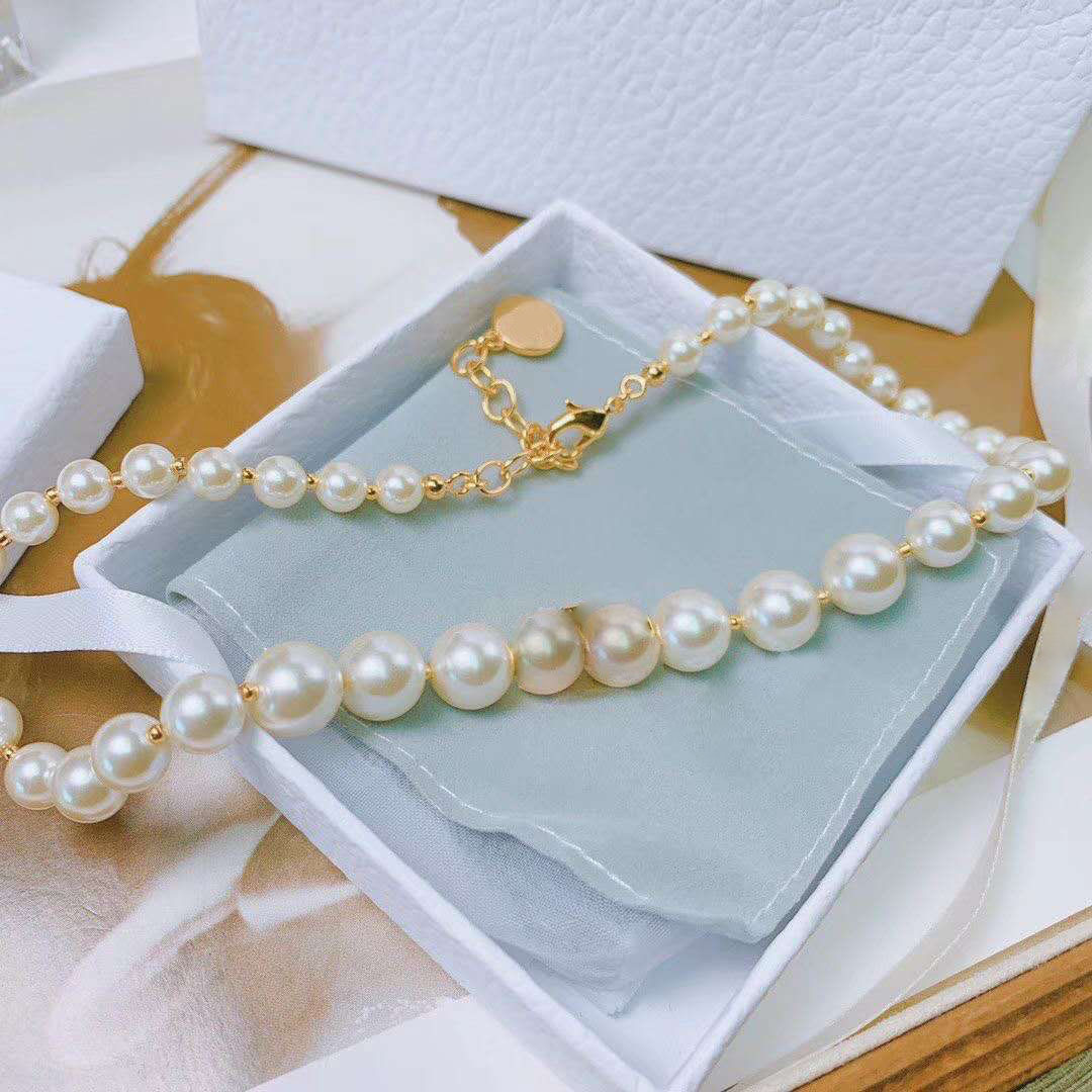 2022 Perle de luxe Pendentif Collier Collier Bracelet Bijoux de mariage Gold Beads Bracelets Colliers Boîte de marque Emballage