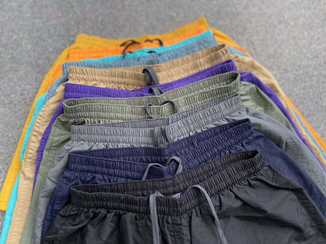 Short d'été décontracté de haute qualité pour la course en plein air à séchage rapide pour hommes et femmes Longueur au genou 15 colore rose roug