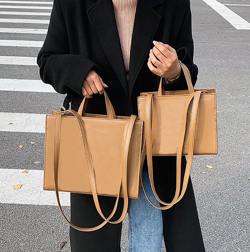 Les sacs fourre-tout en cuir sac à main lettres sac à provisions été fourre-tout tout-match voyage bandoulière mode 2022 Luxurys Designers femmes
