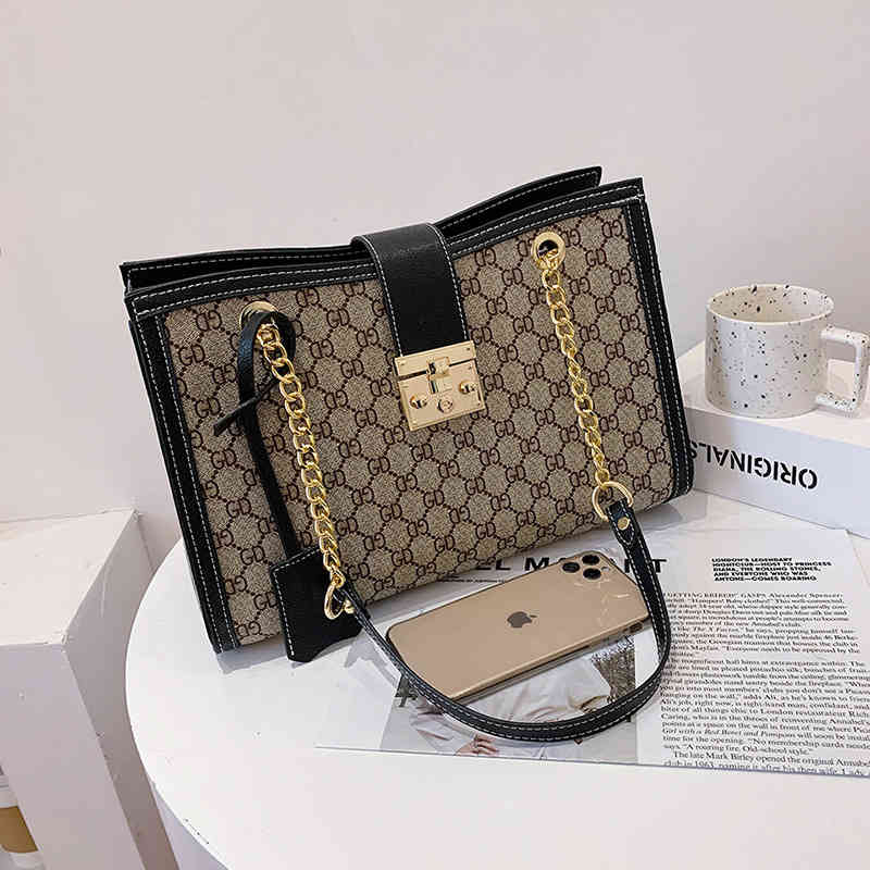 

Store Design Bag Online Export 2023 Factory Wholale New Printed Portable Tote Women's Autumn Fashion High-capacity Single Shoulder Buckle Chain Armpit, Black