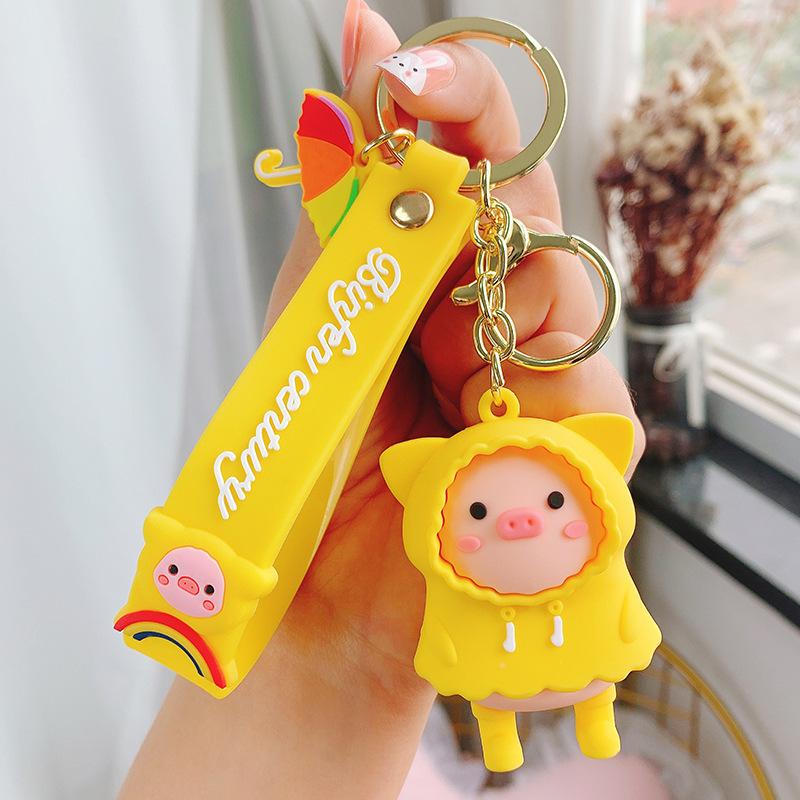 

Keychains Raincoat Piggy Umbrella Cute Keychain Men And Women Couple Bag Fashion Trend Car KeychainKeychains