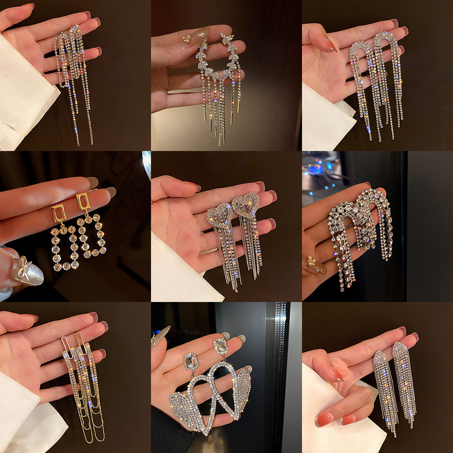 

Charm 925 Silver Needle European and American Fashion Splendid Diamond Bow Tassel Earrings Female Online Influencer Temperament Earrings Simple Ea