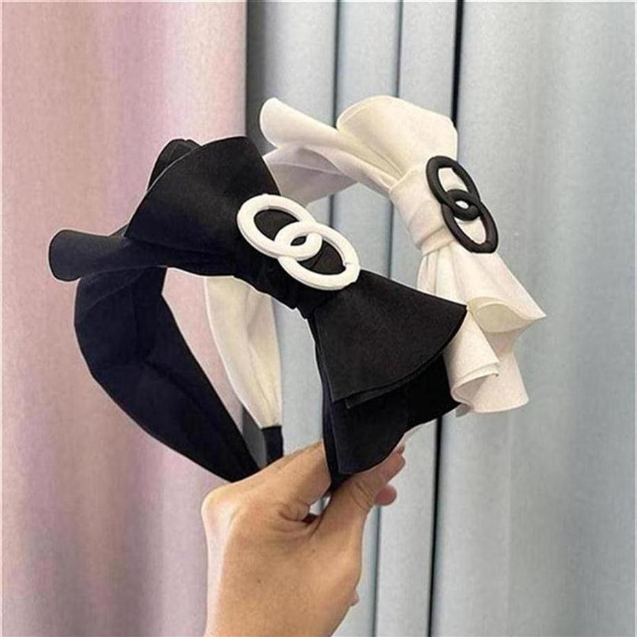

Women Brand Designer Black White Letters Print Bowknot Headband Vintage Simple Wide Edge Cross Knotted Hair Hoop Luxury Small Swee2902