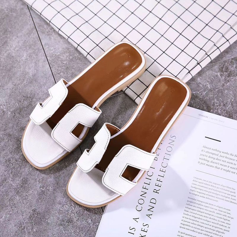 

Summer cool women's flat-bottomed slippers fashionable outerwear all-match casual one-word slipper travel vacation beach slippers