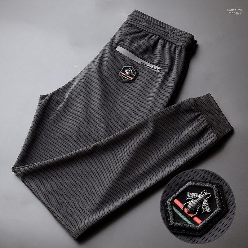 

Men's Pants Summer High-grade Ice Breathable Casual Men's Trend Embroidered Sports Thin Loose Silk Slip PantsMen's Heat22, Black