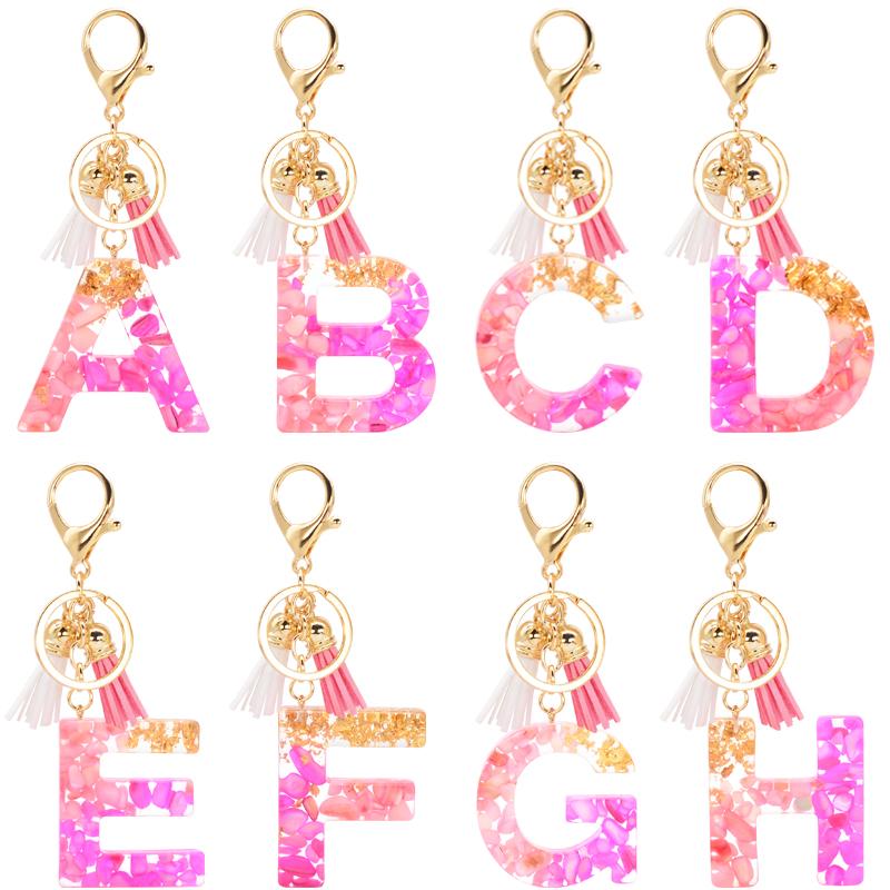 

Keychains 1Pc English Resin Letters Keychain Pink Stone With Tassels Gold Foil Filling Pendant Key Chain Handbag Charms For Women Gift
