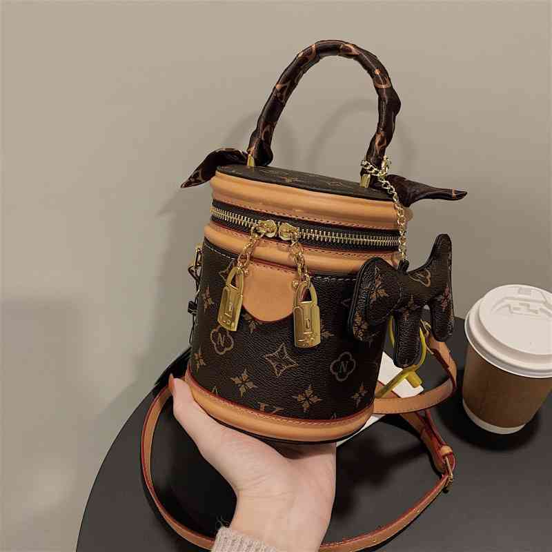 

Cylinder bag female new portable bucket bag sling one Shoulder Messenger Bag, Beige