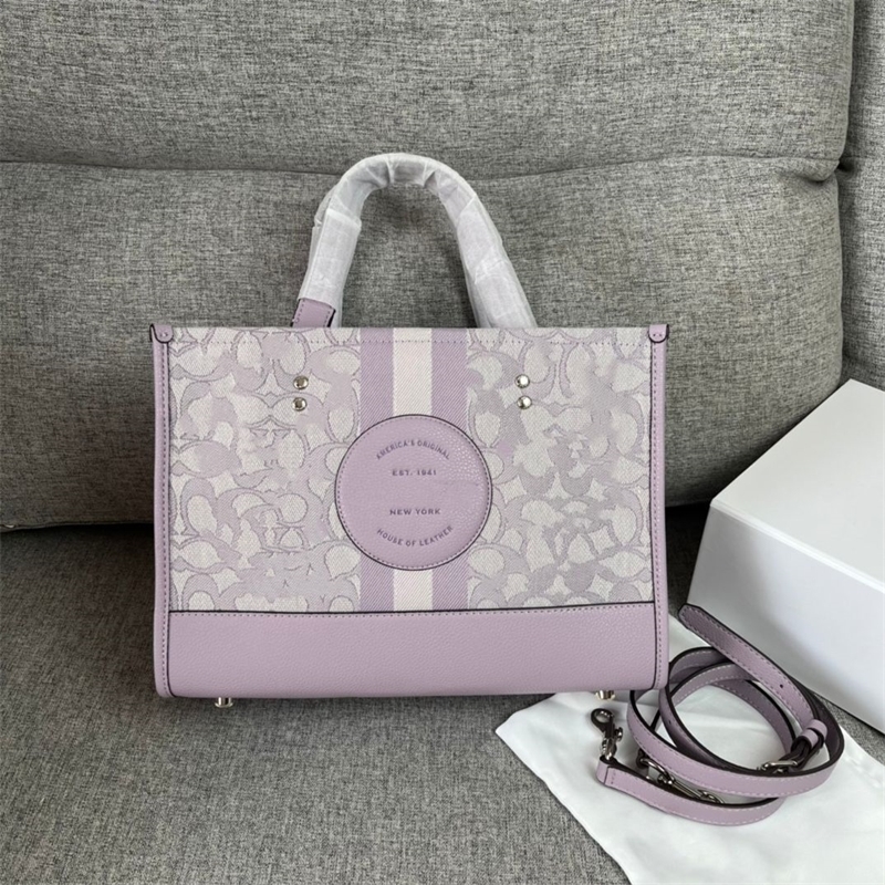 

Designer coac Handbags 7685 Tot Horizontal Style Hemp Thread Embroidery Handheld with the First Layer of Lychee Grain Cow Leather Soft Feel Yzl, Pink jacquard