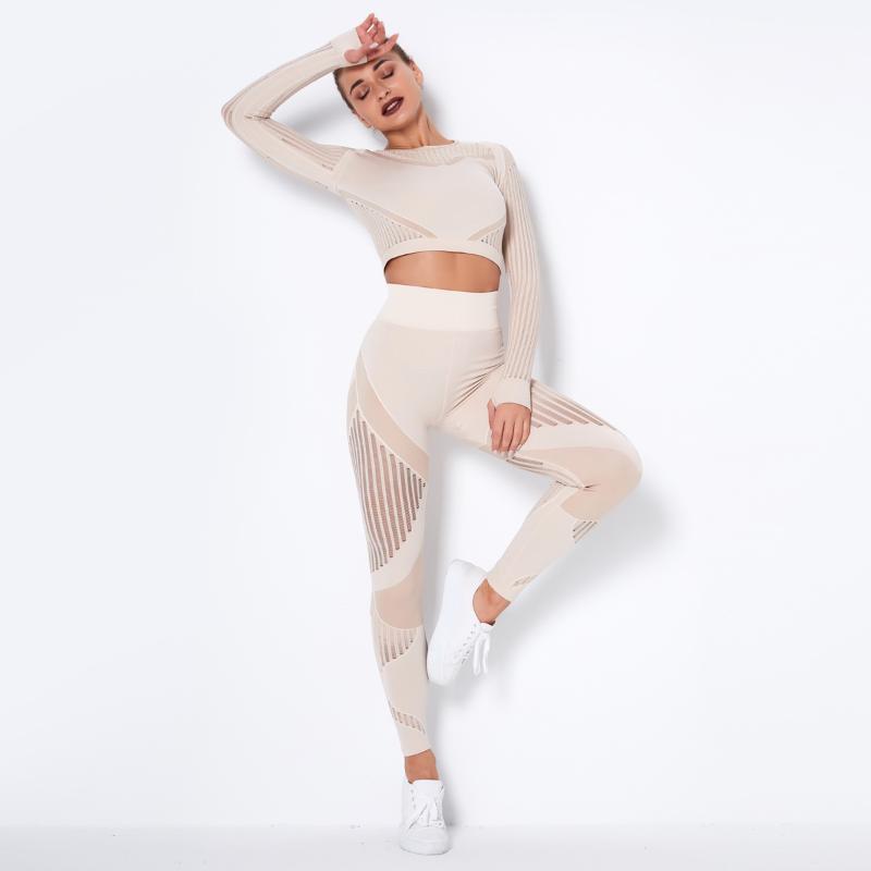 Yoga Outfit Winter Hollow Out Peach Hip Pantalon sans couture Femme à manches longues et leggings Ensemble Vêtements d'entraînement à séchage rap