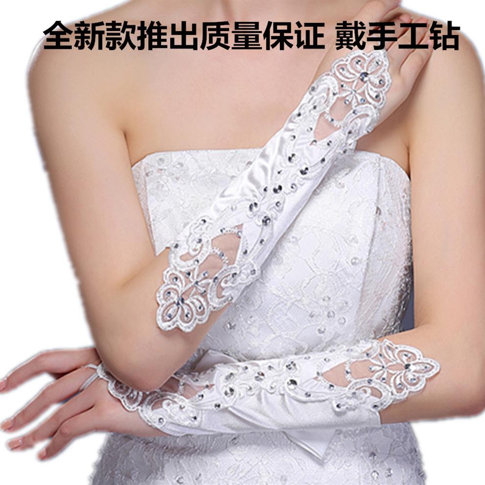 

2021 Beautiful Bridal Gloves White Fingerless Lace Appliqued Pearl Beaded Bridal Gloves Wedding Gloves Cheap EM01467307h