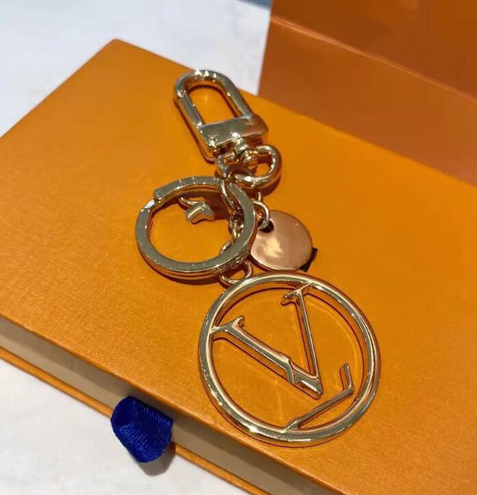 

Keychains Lvss 3D stereo astronaut Viutonity space Letters round card fashion metal key chain pendant accessories original packaging