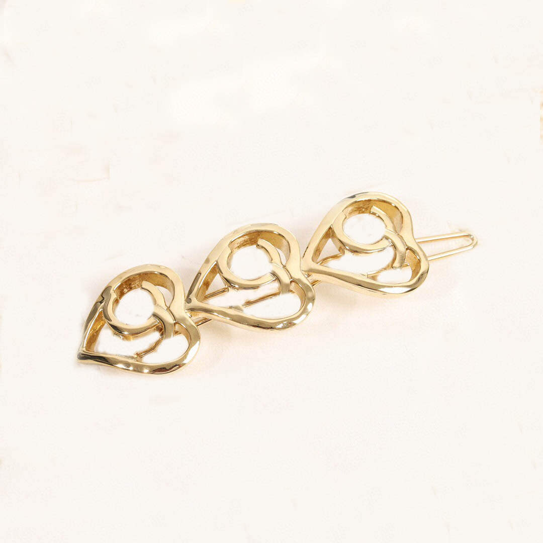 

2022 Top quality Charm hair clip in 18k gold plated three pcs heart shape hollow design for women wedding jewelry gift have box stamp PS7665
