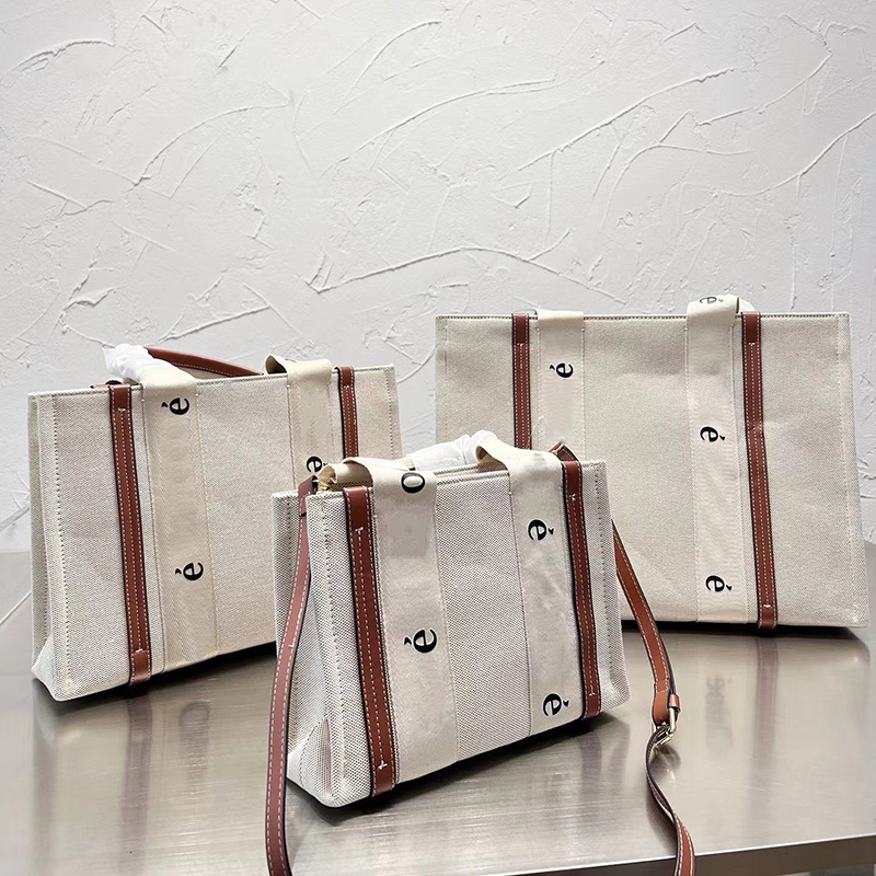 

Designer Women Woody Canvas Tote Bag Luxurys Designers Bags Paris Brand Leather Patchwork Totes Shopping Handbags Lady Large Capacity Mom Shoulder Handbag, Black