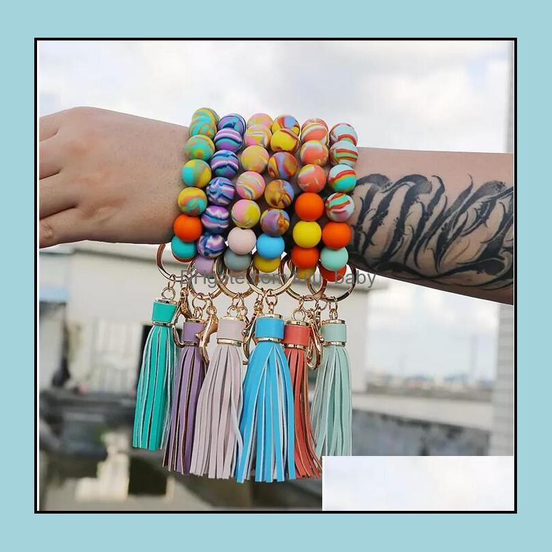 

Keychains Fashion Accessories Sile Beaded Bracelets Keychain Keys Tassel Wood Beads Bracelet Keyring For Women Men Mticolor Bead Drop Delive