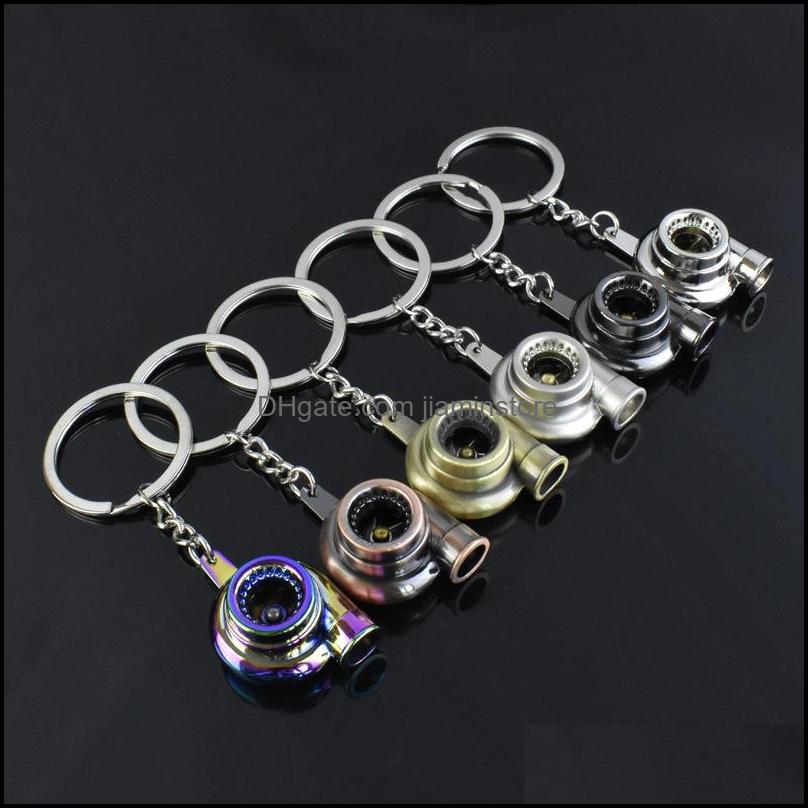 

Keychains Fashion Accessories Metal Turbo Keychain Sleeve Bearing Spinning Part Model Turbine Turbocharger Key Chain Ring 195 U2 Drop Delive