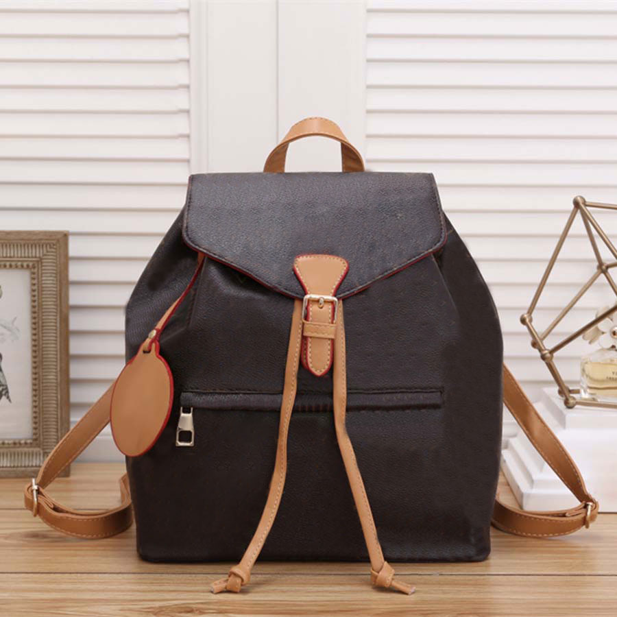 Designer sac à dos masque à la mode complète imprimement sac à dos femme de style classique packs backs homme sacs scolaires élégants Lady Casual