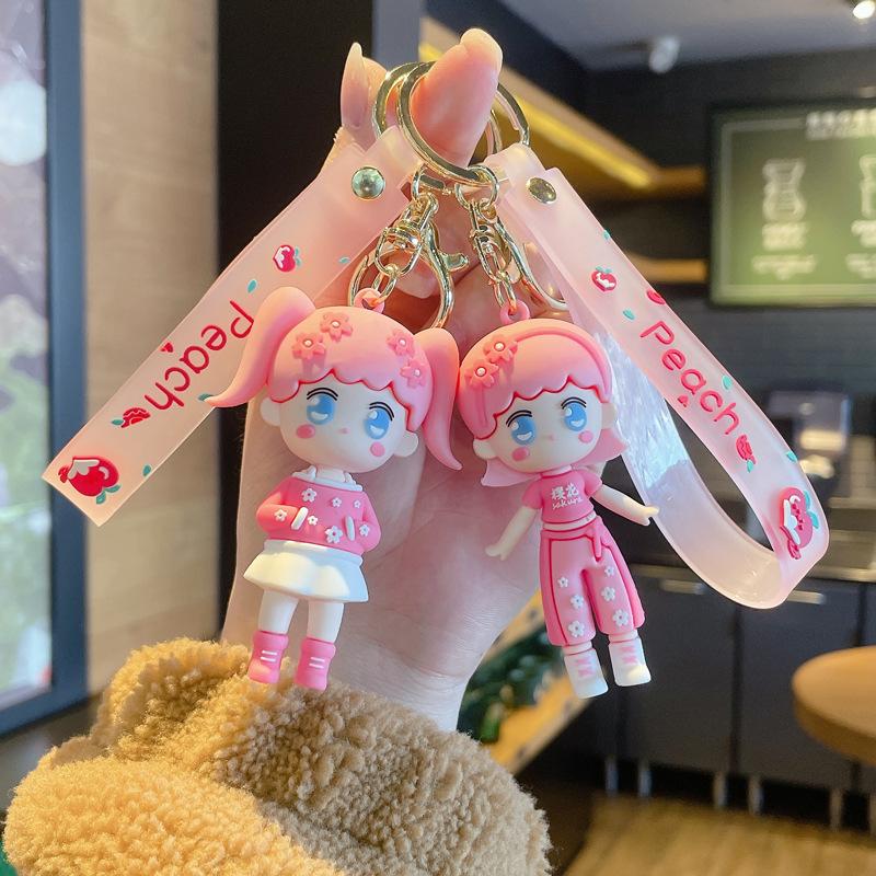 

Keychains The Trend Of Cherry Blossom Girl Epoxy Doll Pendant Cute Bag Small Exquisite Keychain Wholesale
