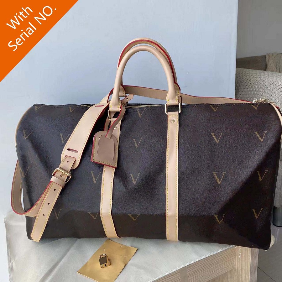 Sacs Duffel 45cm 55cm Grande Capacité Vente de Voyage de haute qualité Femmes Hommes Hommes Véritable Cuir Sac à épaule En Cuir Portez-vous à Bag