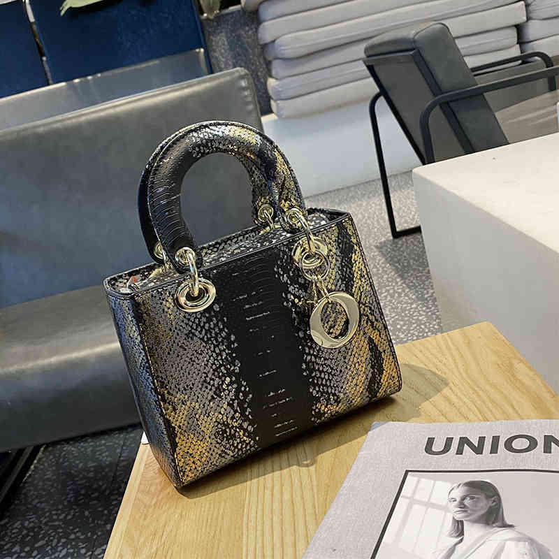 

Women's Fashion Personality Trend Brand Bag Wholesale 2022 New Advanced Sense Portable of Wal Snake Pattern Texture Single Shoulder Msenger Tiktok Live, White