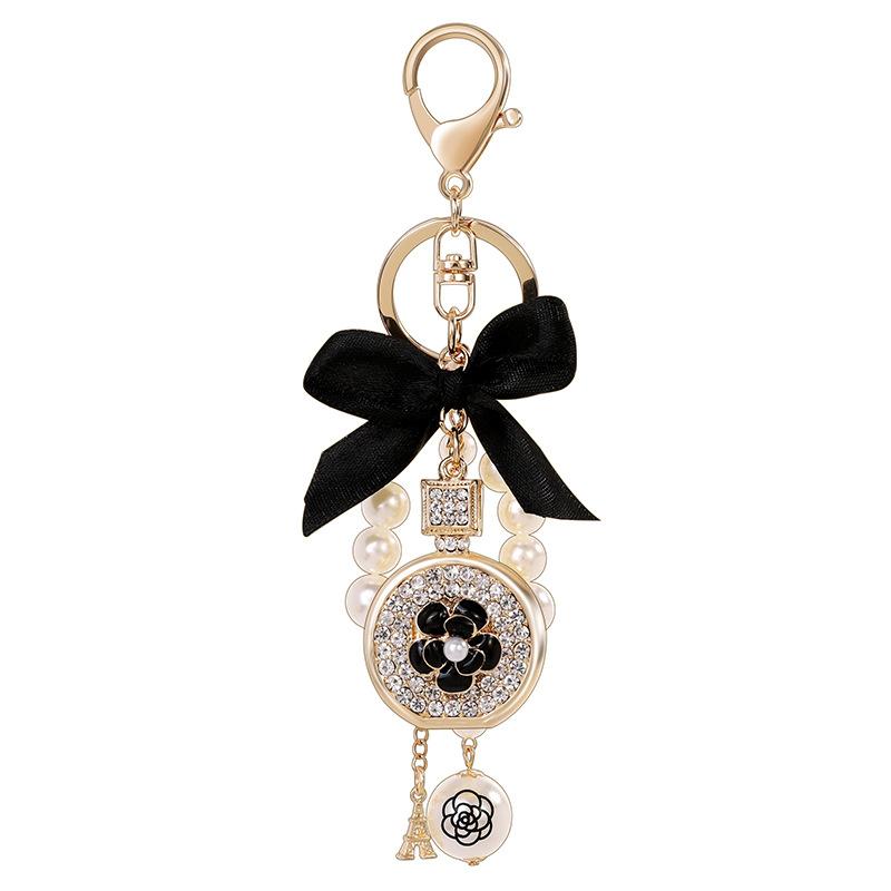 

Keychains Imitation Pearl Perfume Crystal Bottle Iron Tower Chain Keychain Car Key Ring Bag Charm Accessories Bow Women Girl Keyring Gift