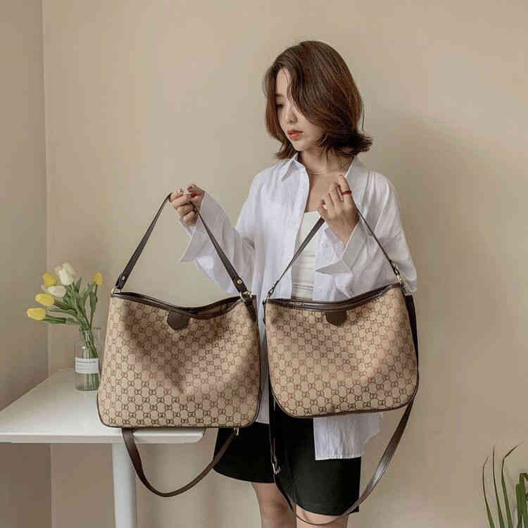 

Bag women's advanced feeling bag new versatile air canvas bag simple one shoulder handbag large capacity, Brown trumpet