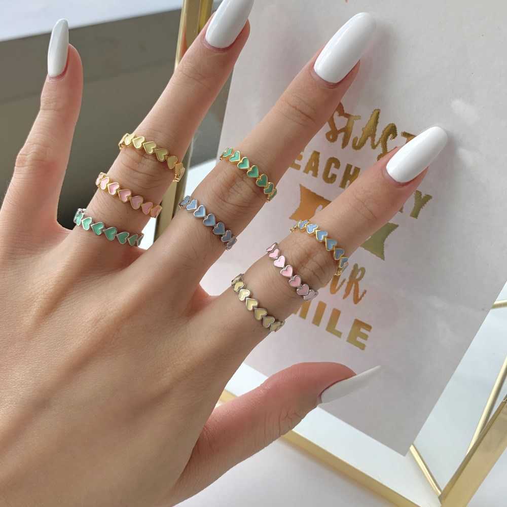 

Korean version S925 Sterling Silver Ring women's color candy color glue dropping enamel love row ring lovely design sense of food ring