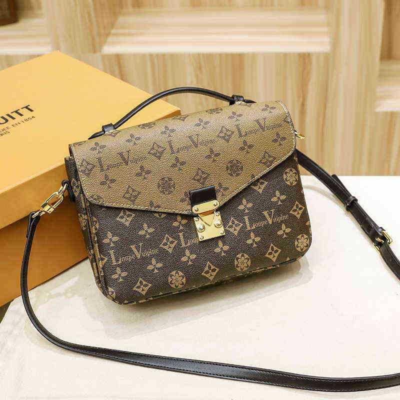 

2022 Old Designer Flower Trend Donkey Postman Bag Versatile French Hand-held Messenger One Shoulder Women's Fashion, Brown