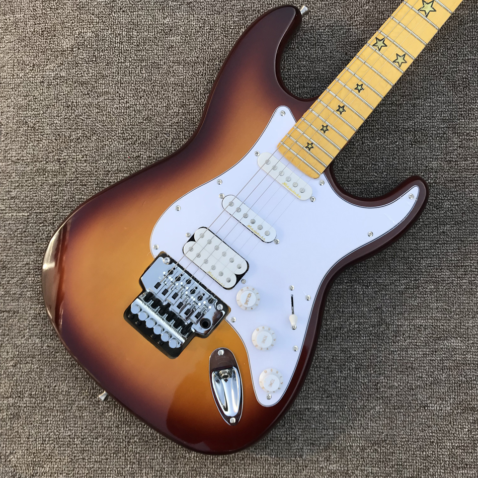 

ST electric guitar, maple fingerboard, 3 pickups, chrome hardware, vibrato system, Sunset color guitar
