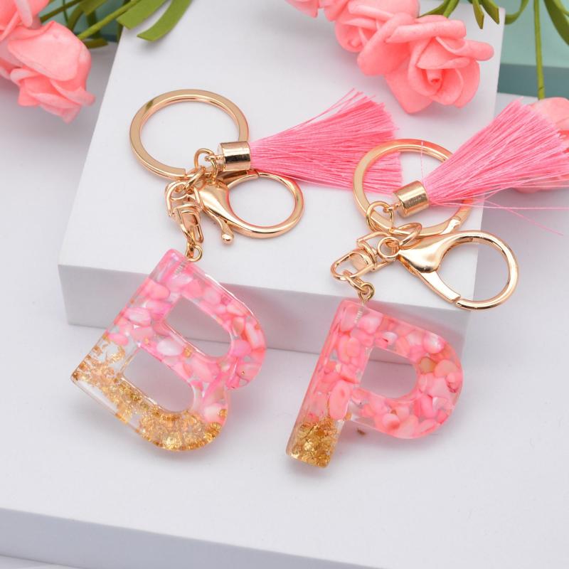 

Keychains Pink Creative Letter Liquid 26 Glitter English Alphabet Ball Car Bag Tassels Pendent Crystal KeyringKeychains