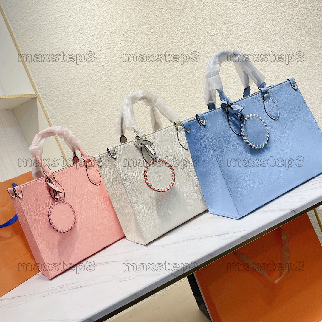 

2022SS By the Pool Onthego MM Tote Bag Gaint Monograms Print Handle Bag with Flower Tag Luxurys Women Shoulder Bags 35cm