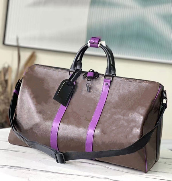 Designer case bags 50cm luxury large capacity travel high quality leather single shoulder lock riveting fashion bag rose red fluorescent yellow g