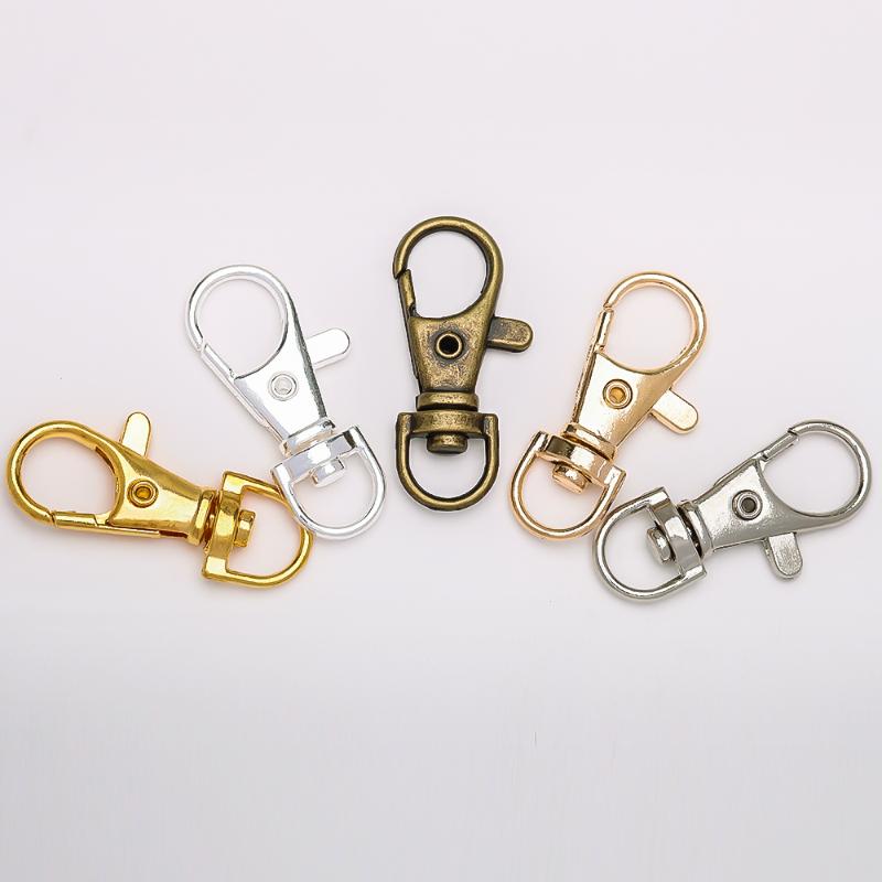 

Keychains 10pcs Gold Split Key Ring Swivel Lobster Clasp Connector For Bag Belt Dog Chains DIY Jewelry Making Findings WholesaleKeychains