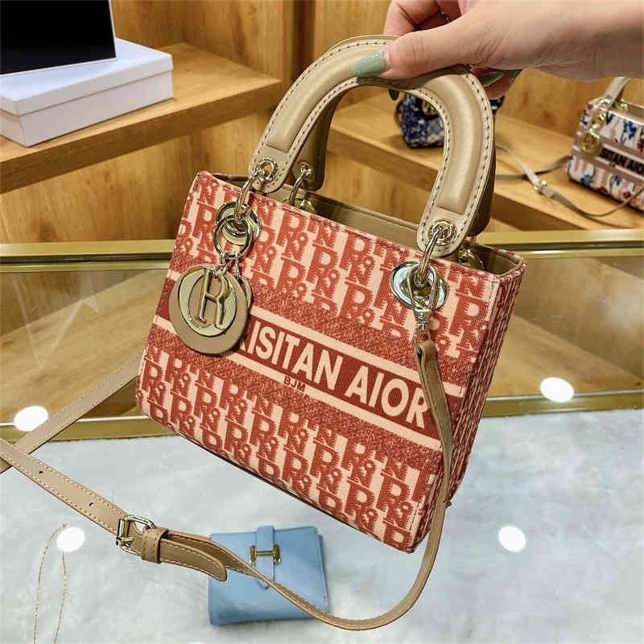 

Explosive models 72% OFF 2022 New Fashion Handbags simple straddle personalized printed portable, Blue