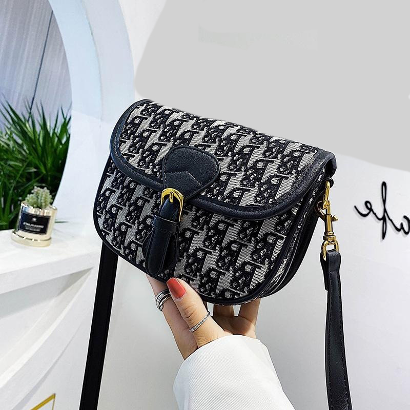 

Fashion Accessories letter D OR canvas saddle bags Europe and America retro wide shoulder bag cross-body bag star with the same semicycle