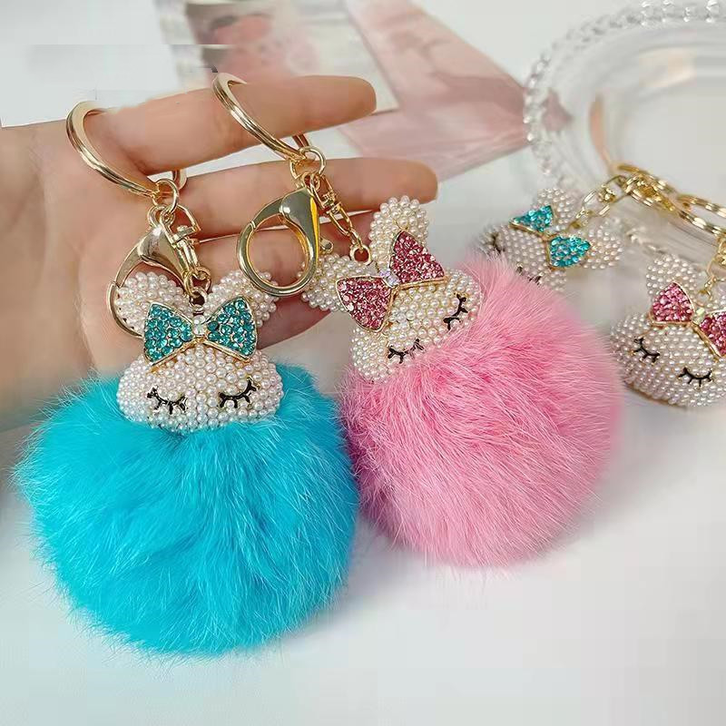Perle Rabbit Fluffy Faux Fur Ball Kechechains Femmes Girls Car école de voiture Anneau clé Jijou de porte-clés Pompom Mignon Accessoires