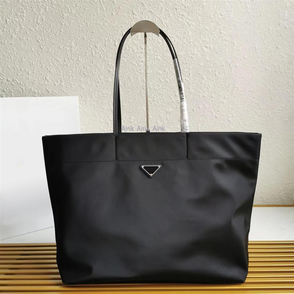 

Whole Luxury Designer Brands Shopping Bags Women Triangle Label Waterproof Leisure Travel Bag Large Capacity Nylon Mommy Tote 254L, Pay for fedex