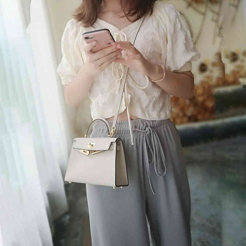 

Herme Designer Handbag High Grade Hand Feeling Palm Print Head Leather h Second Generation Kelys Bag Mini Women's Messenger One Shoulder