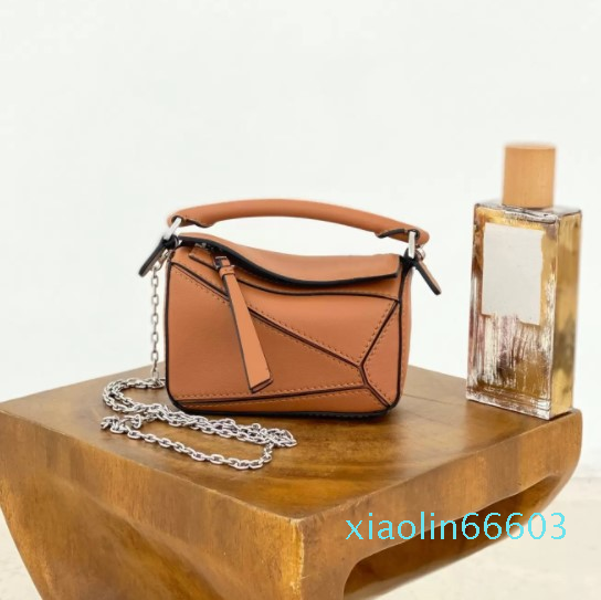 

Designer-women's geometry Lingge bag handbag messenger one shoulder leather women's bag A variety of back chain bags, Blue