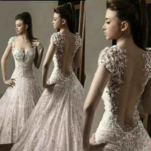 

Gorgeous Appliqued Lace Beaded Wedding Dresses Rami Salamoun Plunging Neck Sweep Train Tulle A-Line Backless Bridal Gowns, Champagne