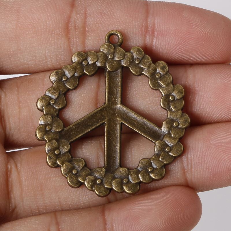 

Free shipping New Wholesale Antique Bronze Plated Vintage Charms Mixed Peace Symbol Pendants Metal Jewelry Making Fit Bracelets Necklace DI